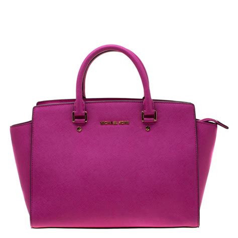 michael kors large fuschia purse|largest michael kors bag.